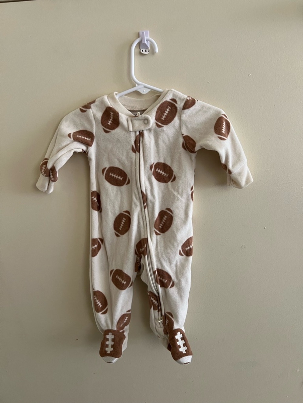Carter's Cream One-Piece with Brown Footballs